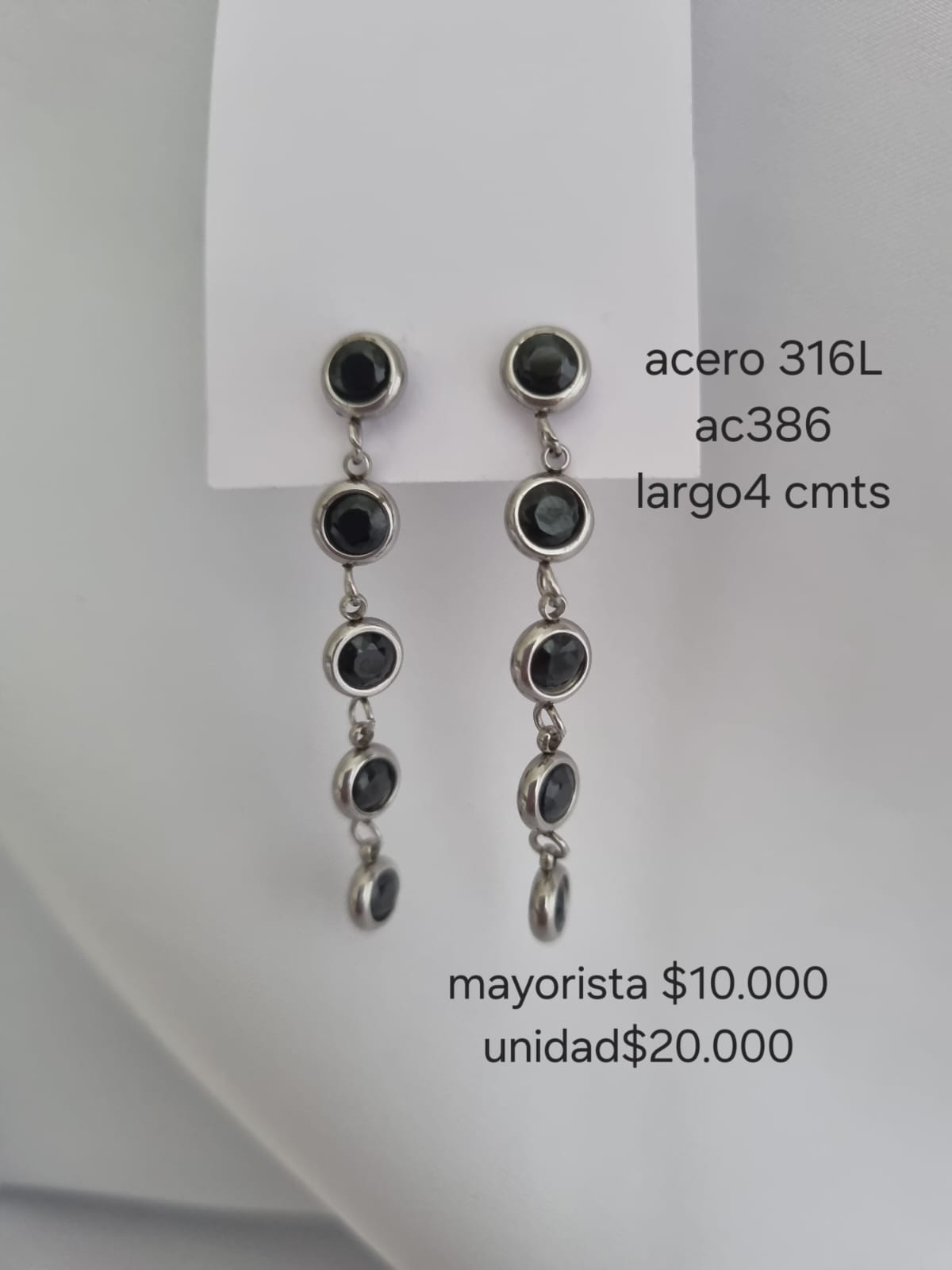 Ac 386 aretes en acero precio mayorista